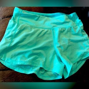 Size 6 Electric Turquoise Lululemon Speed Up shorts